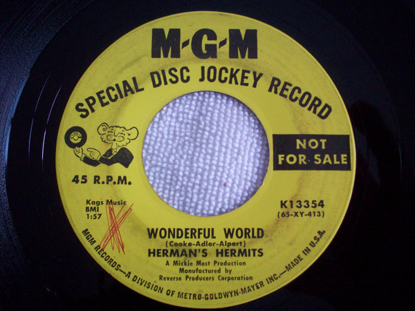Wonderful World / Traveling Light