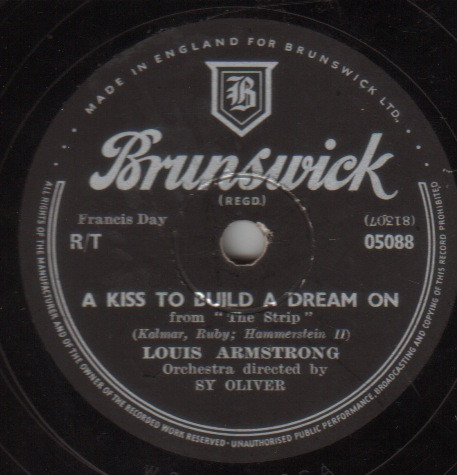 A Kiss To Build A Dream On / Your Cheatin' Heart